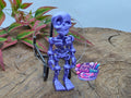 Movable Skeleton Cover Minder - Purple