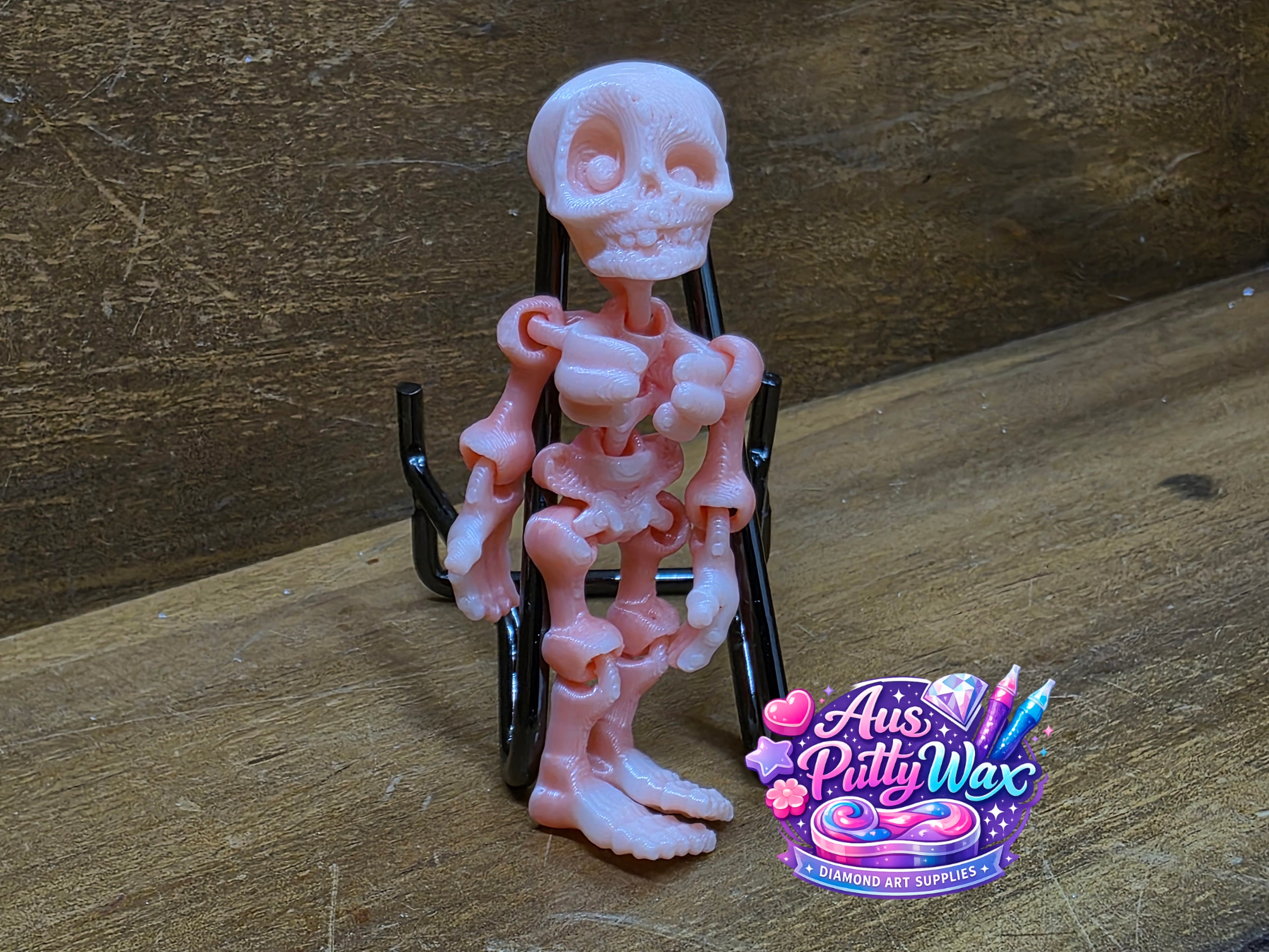 Movable Skeleton Cover Minder - Pink/Cream