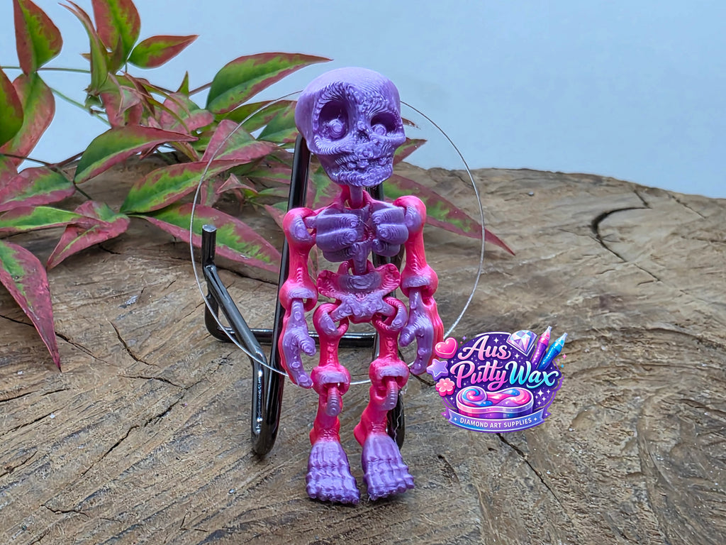 Movable Skeleton Cover Minder - Purple/Pink